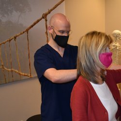 Total Osteopathic Medicine - Benjamin Stumpf, DO - Dr. Stumpf hard at work treating patients