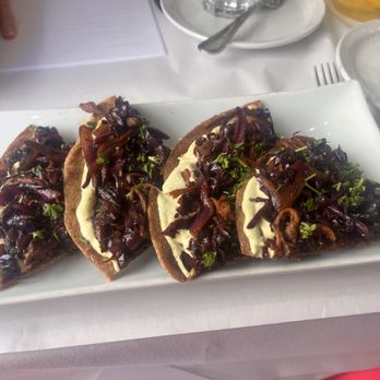 Berbere - mushroom flatbread? can't remember but another person's review helped me order these delicious things. - Vegan Near Me - Santa Monica, California Berbere - mushroom flatbread? can't remember but another person's review helped me order these delicious things. - Vegan Near Me - Santa Monica, California