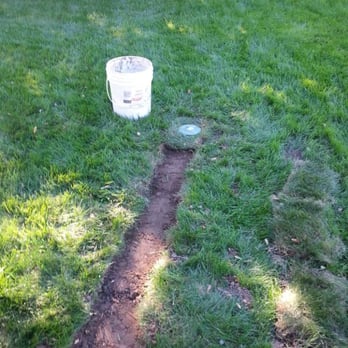 Rangel's Waterproofing & Construction - Burying Downspout Away From Home (2of2) - Foundation Repair Near Me