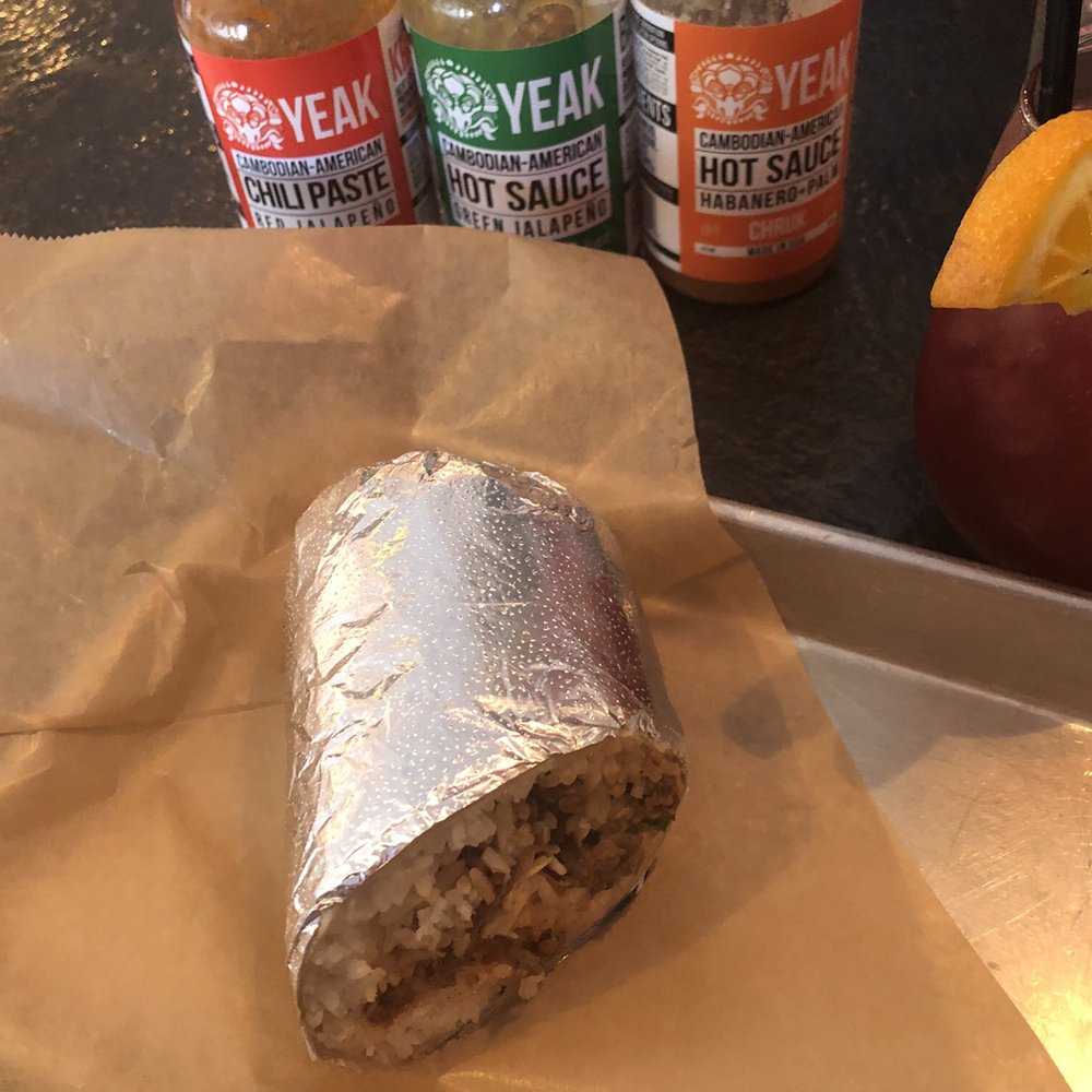 Chuey Fu's - Korean beef burrito (half of it) and all the hot sauces plus the sangria - Asian Fusion Near Me - Denver, Colorado Chuey Fu's - Korean beef burrito (half of it) and all the hot sauces plus the sangria - Asian Fusion Near Me - Denver, Colorado