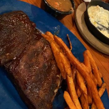 Brickyard Pub And BBQ - 1/2 rack of St. Louis ribs with Brickyard beans, sweet potato fries and cornbread - Barbeque Near Me - Lewiston, New York
