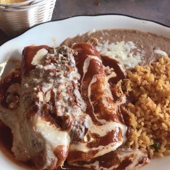 Monterrey Mexican Restaurant - Tamale, chicken enchilada with rice and beans - Mexican Near Me - Newark, New York Monterrey Mexican Restaurant - Tamale, chicken enchilada with rice and beans - Mexican Near Me - Newark, New York