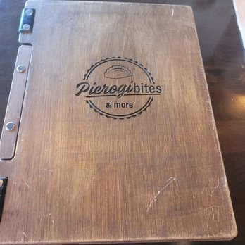 Pierogibites & More - The menu with wooden covers - Polish Near Me - Bellmore, New York Pierogibites & More - The menu with wooden covers - Polish Near Me - Bellmore, New York