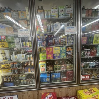 Pat & Gary's - a display case of beer - Grocery Near Me - Indian River, Michigan