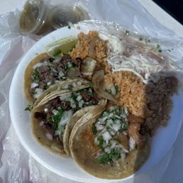 Asada, Chicharron, Al Pastor Tacos Plate with rice and beans Asada, Chicharron, Al Pastor Tacos Plate with rice and beans