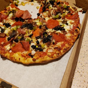 Fatte's Pizza - a half eaten pizza in a box - Pizza Near Me - Chula Vista, California Fatte's Pizza - a half eaten pizza in a box - Pizza Near Me - Chula Vista, California
