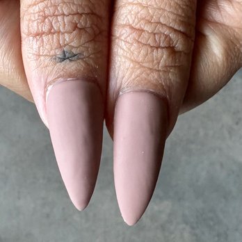 Paris's Nails & Spa - not even close. she already re-did one thumb bc it was crooked. - Nail Salons Near Me - Houston, Texas