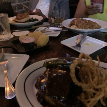 Bosscat Kitchen & Libations - short ribs, catfish & grits, pork and polenta and corn bread in the middle - New American Near Me - Houston, Texas