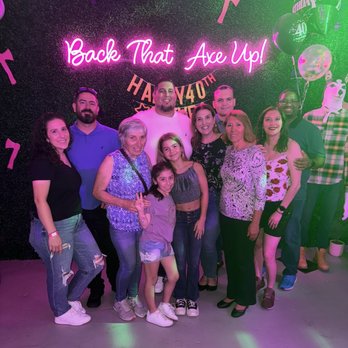 Delirium Axe Throwing - Very cute backdrop. Very Instagrammable! - Axe Throwing Near Me - Miami, Florida Delirium Axe Throwing - Very cute backdrop. Very Instagrammable! - Axe Throwing Near Me - Miami, Florida