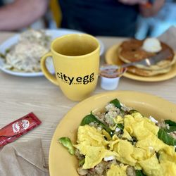 City Egg - Quinoa bowl, big city, breakfast, and a stack of blueberry pancakes. The dark roast coffee is solid.