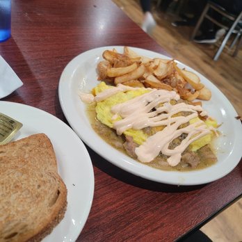 The Coffee Cup - Pork chili verde omlette with chocolate sour cream - Diners Near Me - Boulder City, Nevada The Coffee Cup - Pork chili verde omlette with chocolate sour cream - Diners Near Me - Boulder City, Nevada
