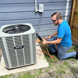 Backs Mechanical - Jeremy working on the outdoor unit