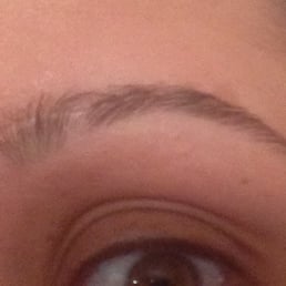 Middle of eyebrow waxed off. Looks much worse in-person. Middle of eyebrow waxed off. Looks much worse in-person.