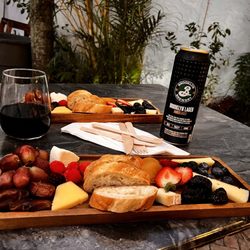 The Cheese Shoppe - Glass of wine and lager with Charcuterie.