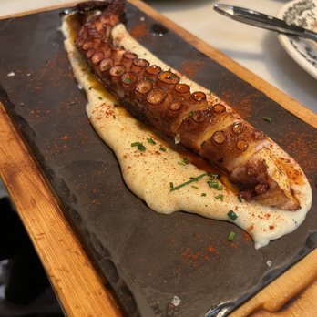 La Puntual - Pulpos a la plancha (grilled octopus) - Performing Arts Near Me - Barcelona, B La Puntual - Pulpos a la plancha (grilled octopus) - Performing Arts Near Me - Barcelona, B