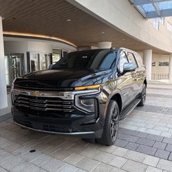 Black Gold Transportation - Executive Curbside Pickup by Black Gold Transportation