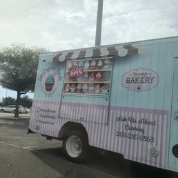 The truck was parked outside of the mall The truck was parked outside of the mall