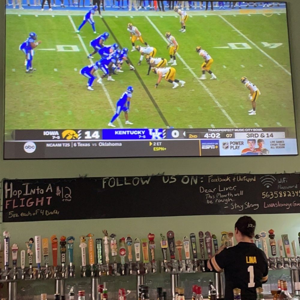 Lina's Lounge - a football game on a big screen - Sports Bars Near Me - Dubuque, Iowa