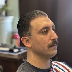 Barberian's Barbershop - Proper men's cut done by JLO.