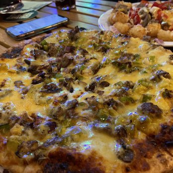 The Growler Guys - Philly cheesesteak pizza - Beer Gardens Near Me - Seattle, Washington The Growler Guys - Philly cheesesteak pizza - Beer Gardens Near Me - Seattle, Washington