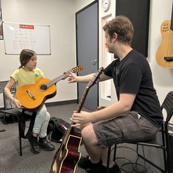 Music Lab Woodland Hills - Instructor Nate teaching a Guitar Lesson
(Guitar Instructor with young student)
