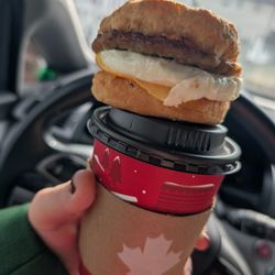 Tim Hortons - Sausage egg and cheese on a biscuit and coffee