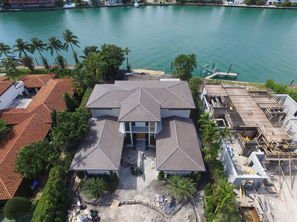 Slide of Caye Works Roofing