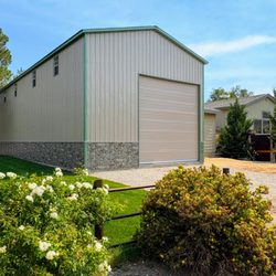 Delta Carports - 24x60x18 metal garage in Reno Nevada
Roof and trim- Patina Green
Side Panel- Clay
Wainscot 4'- light rock