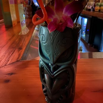 Pete’s Tiki Tiki - a tiki with a flower in it - Tiki Bars Near Me - Rosemont, Illinois Pete’s Tiki Tiki - a tiki with a flower in it - Tiki Bars Near Me - Rosemont, Illinois