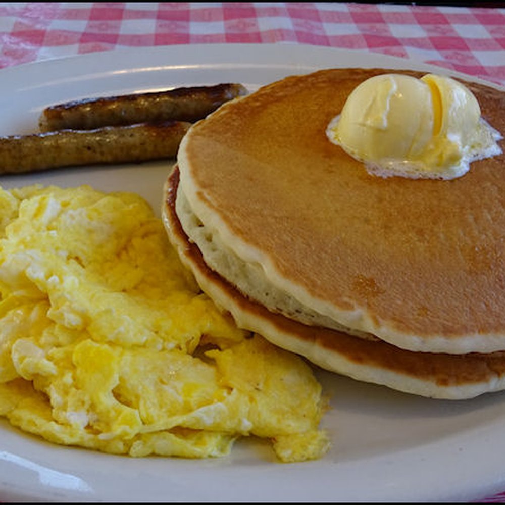 Roys Cafe - From the "Pancakes" section of the menu, Tom went with "Three Pancakes, Two Eggs and Two Sausages." Delicious! - Cafes Near Me - Barstow, California Roys Cafe - From the "Pancakes" section of the menu, Tom went with "Three Pancakes, Two Eggs and Two Sausages." Delicious! - Cafes Near Me - Barstow, California