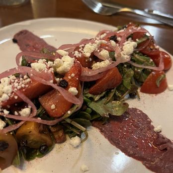The Whistling Grizzly - Salad with huckleberry sauce - American Near Me - Jackson, Wyoming