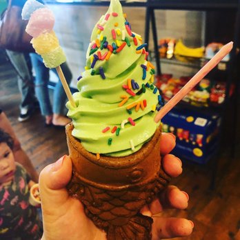 Sugar Koi - Green tea soft serve with sprinkles, Mochi and poke stick. The fish had a hint of cinnamon and was delicious ! Would recommend!! - Ice Cream & Frozen Yogurt Near Me - Cary, North Carolina