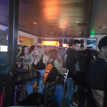 Low Key Saloon - a crowd of people at a bar - Sports Bars Near Me - Modesto, California