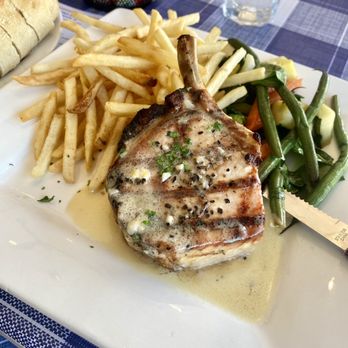 Bistro St Germain - Grilled and Marinated Pork Chop - French Near Me - Seal Beach, California Bistro St Germain - Grilled and Marinated Pork Chop - French Near Me - Seal Beach, California