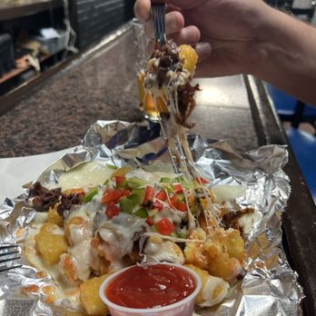 The Cue Club - Bulgogi tots - Sports Bars Near Me - Annandale, Virginia The Cue Club - Bulgogi tots - Sports Bars Near Me - Annandale, Virginia