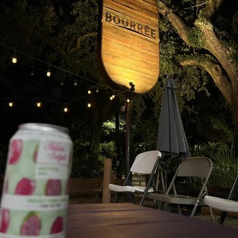 Bourrée - a can of beer sitting on a table - Chicken Wings Near Me - New Orleans, Louisiana