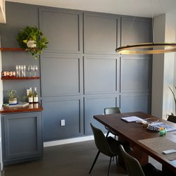 The Boss Workshop - Feature Wall with shelving and wine-fridge cabinet