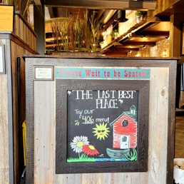 a chalkboard sign for the menu