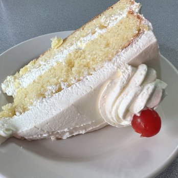 Barracuda Deli Cafe - Piña Colada Cake and as good as the drink - Caribbean Near Me - Seminole, Florida