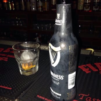 Arlie Muck's Tavern - a bottle of guinness - Pool Halls Near Me - Fort Smith, Arkansas
