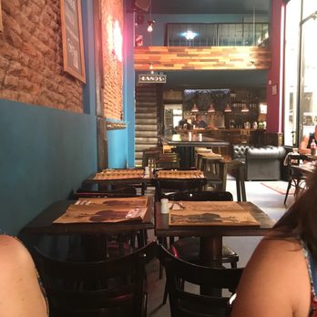 Gipsy - Indoor and patio seating available. Photo with bar area in the far end. - Children's Clothing Near Me - Buenos Aires, C