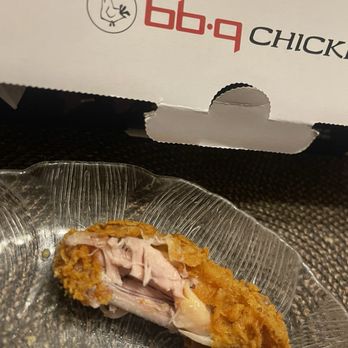bb.q Chicken Gardena - Spicy bone in wings slightly undercooked, you can still see some pink in the chicken. - Chicken Wings Near Me - Gardena, California