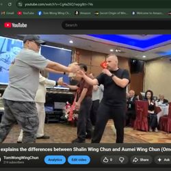 Tom Wong Wing Chun Kung Fu - Students breaking board from one inch distance