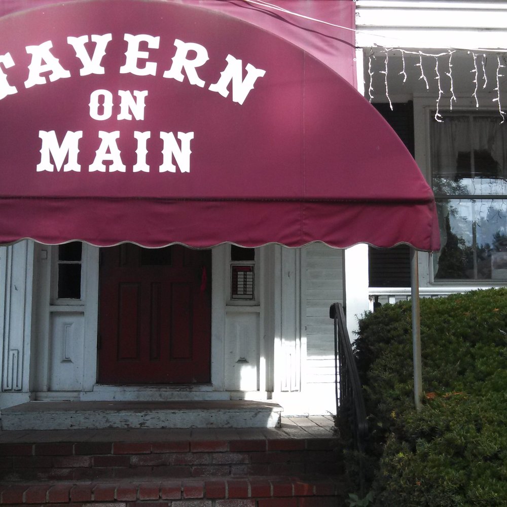 The Tavern on Main - Main entrance (next to Sunoco) - American Near Me - Chepachet, Rhode Island The Tavern on Main - Main entrance (next to Sunoco) - American Near Me - Chepachet, Rhode Island