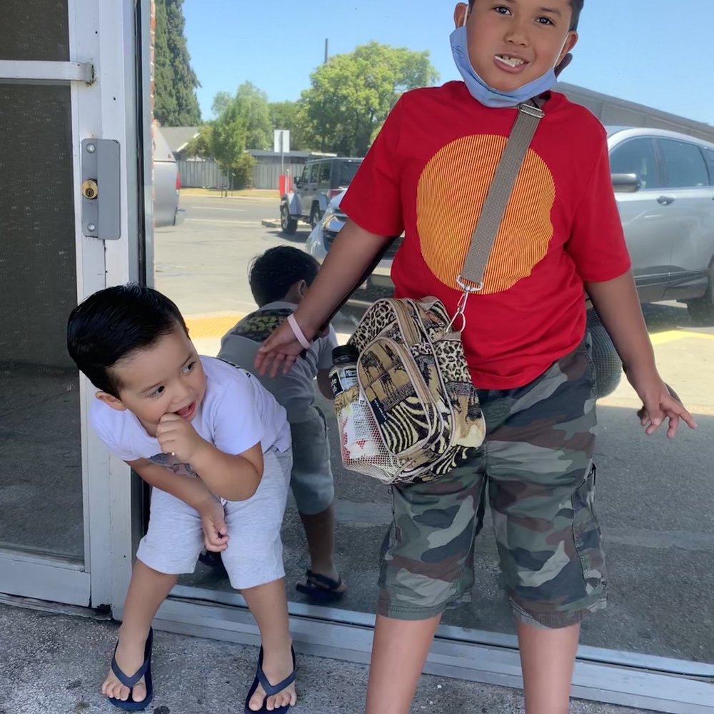 Both my boys after their cuts