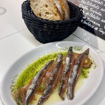 Tapas 24 - Anchoas 00 con tomate fresco y albahaca Anchovies 00 with fresh tomato and basil, side rustic bread - Tapas Bars Near Me - Barcelona, B Tapas 24 - Anchoas 00 con tomate fresco y albahaca Anchovies 00 with fresh tomato and basil, side rustic bread - Tapas Bars Near Me - Barcelona, B
