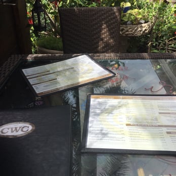 Malbec & More - Outside patio table. - Wine Bars Near Me - Lantana, Florida