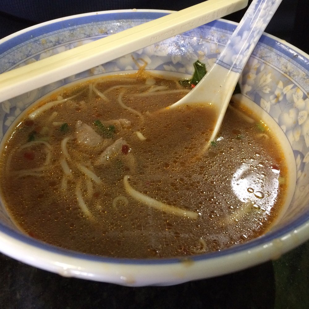 Half eaten bowl of Pho with rare meat that cooks in the broth...yum! Half eaten bowl of Pho with rare meat that cooks in the broth...yum!