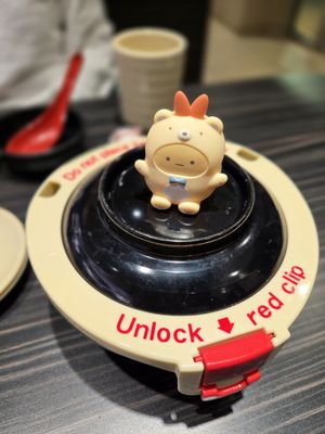 Kura Revolving Sushi Bar by null