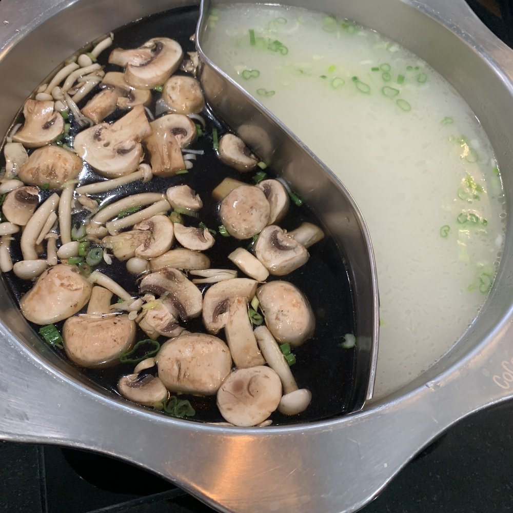 Coco Hot Pot - Mushroom and chicken broth heating. - Chinese Near Me - Columbus, Ohio Coco Hot Pot - Mushroom and chicken broth heating. - Chinese Near Me - Columbus, Ohio